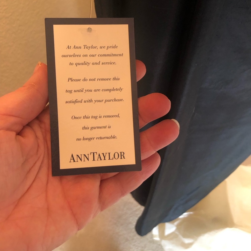 Black spaghetti strap formal dress with delicate beading on the sides. Gorgeous!